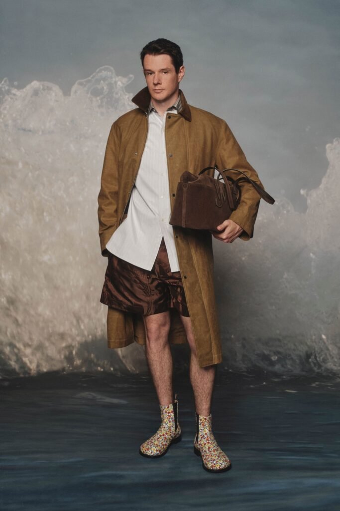 Image may contain Connor Swindells Clothing Coat Jacket Adult Person Blazer Skirt Fashion Accessories and Bag