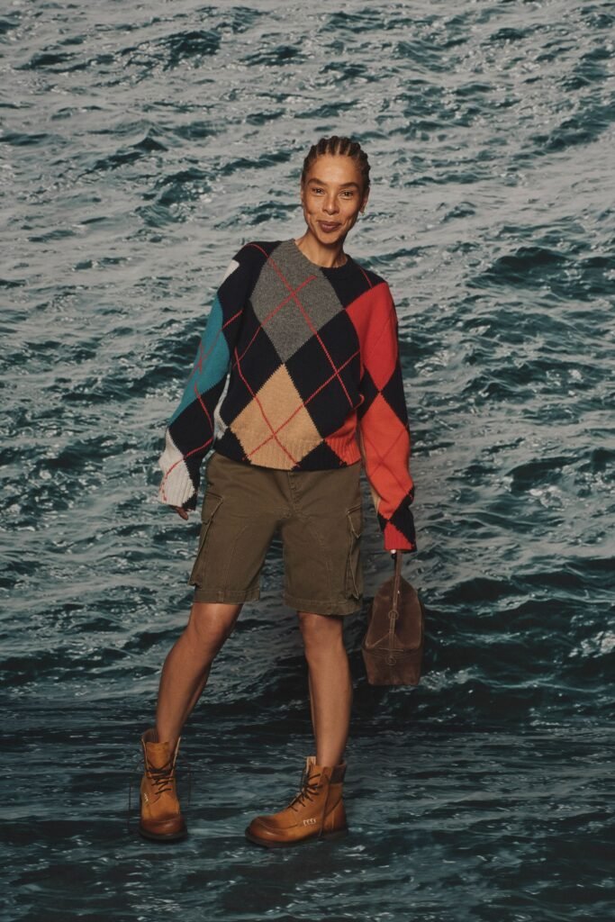 Image may contain Sophie Okoneda Blanket Clothing Shorts Adult Person Knitwear and Sweater